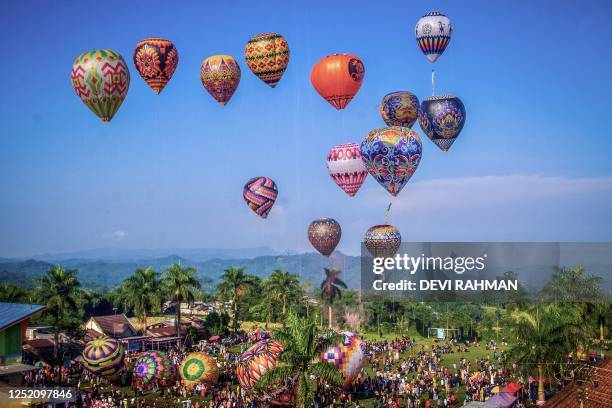 Large number of Indonesians congregate at the hot air balloon festival site at in Wonosobo on April 23 to celebrate the lengthy Eid al-Fitr holiday...