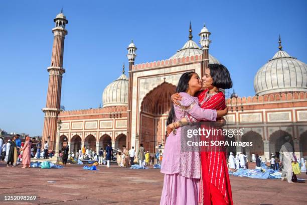 Young Muslim ladies celebrate Eid al-Fitr festival at Jama Masjid mosque. Eid Al-Fitr is a festival that marks the end of the Muslim holy month of...