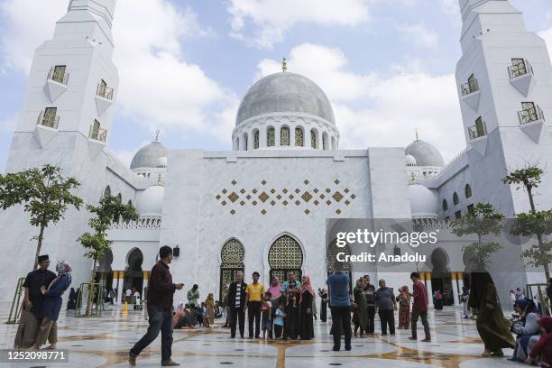 People spend their time with family visiting Sheikh Zayed Grand Mosque to celebrate the Eid Al-Fitr Holiday, which marks the end of the fasting month...