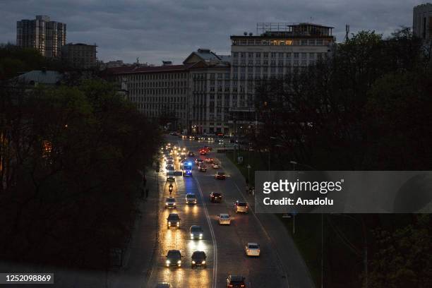 View of car driving on the street in the evening as daily life continues amid Russia-Ukraine war, in Kyiv, Ukraine on April 22, 2023.