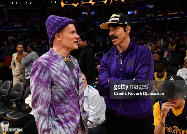 Red Hot Chili Peppers band members Flea and Anthony Kiedis attend the basketball game between Los Angeles Lakers and Memphis Grizzlies during Round 1...