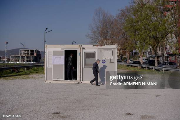 Man leaves a polling station in the north of Mitrovica, predominantly populated by the ethnic Serb minority amid the municipal elections in the north...