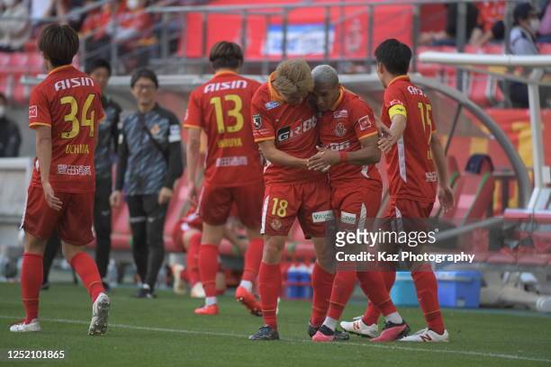 Mateus Castro of Nagoya Grampus celebrates a 4th goal with Kensuke Nagai of Nagoya Grampus which was cancelled later because of the penalty kick...