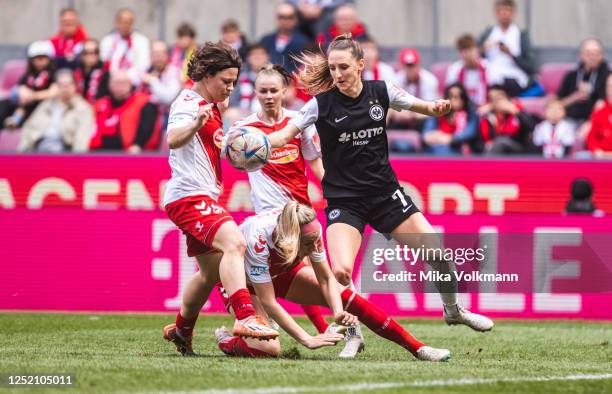 Ally Gudorf of 1. FC Koeln challenges Lara Prasniker of Eintracht Frankfurt during the FLYERALARM Frauen-Bundesliga match between 1. FC Koeln and...