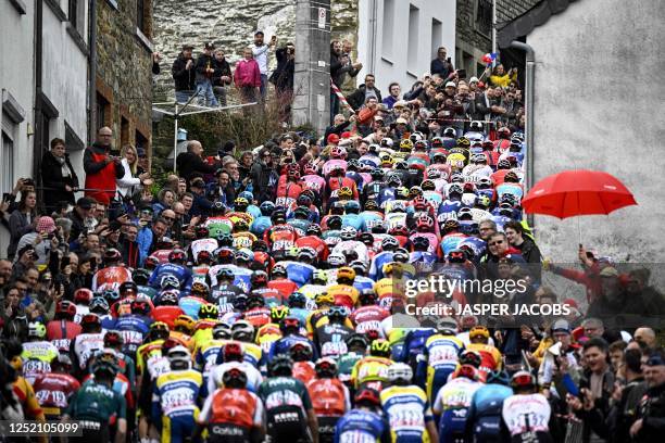 The pack of riders pictured in action during the men elite race of the Liege-Bastogne-Liege one day cycling event 5km from Liege, over Bastogne to...