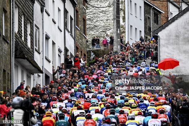 The pack of riders cycles during the men's elite race of the Liege-Bastogne-Liege one day cycling event 5 km round-trip from Liege via Bastogne, on...