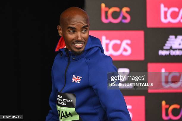 Britain's Mo Farah attends a press conference after finishing the men's race in 9th place at the finish of the 2023 London Marathon in central London...