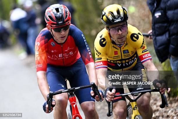 Ineos Grenadiers' US rider Magnus Sheffield and Jumbo-Visma's Slovenian rider Jan Tratnik cycle during the men's elite race of the...