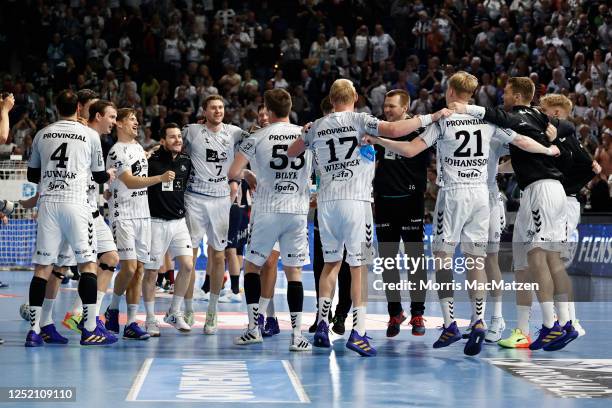 Team members of Kiel celebrate after winning the LIQUI MOLY HBL match between THW Kiel and SG Flensburg-Handewitt at Wunderino Arena on April 23,...