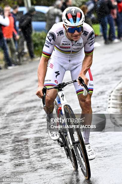 Soudal Quick-Step's Belgian rider Remco Evenepoel cycles in a breakaway during the men's elite race of the Liege-Bastogne-Liege one day cycling event...