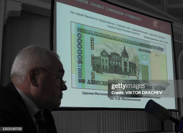 New 200,000 Belarus ruble note is displayed on a big screen during the note's presentation in the Belarusian National Bank headquarters in Minsk, on...