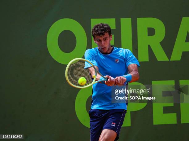 Juan Manuel Cerundolo of Argentina plays against Zsombor Piros of Hungary during the Final of the Oeiras Open tournament at Clube de Ténis do Jamor....