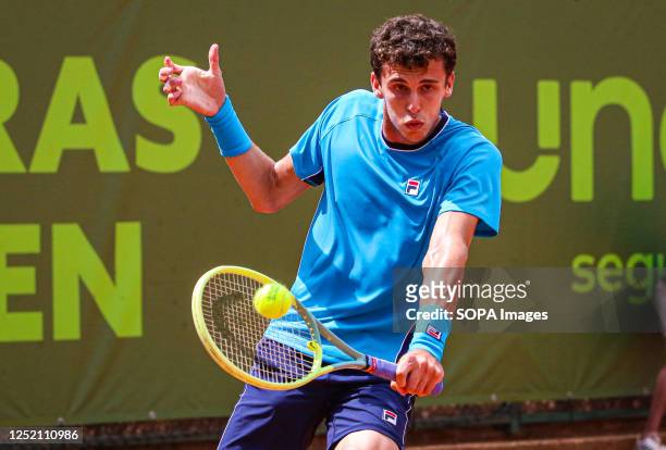 Juan Manuel Cerundolo of Argentina plays against Zsombor Piros of Hungary during the Final of the Oeiras Open tournament at Clube de Ténis do Jamor....