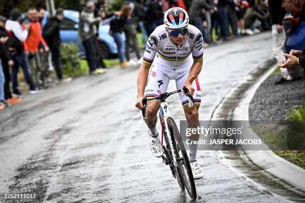 Soudal Quick-Step's Belgian rider Remco Evenepoel cycles in a breakaway during the men's elite race of the Liege-Bastogne-Liege one day cycling event...