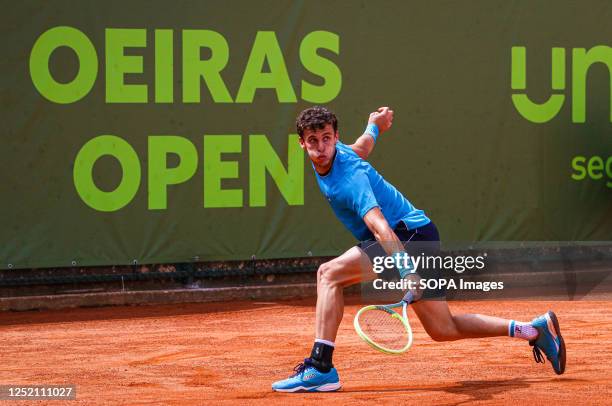 Juan Manuel Cerundolo of Argentina plays against Zsombor Piros of Hungary during the Final of the Oeiras Open tournament at Clube de Ténis do Jamor....