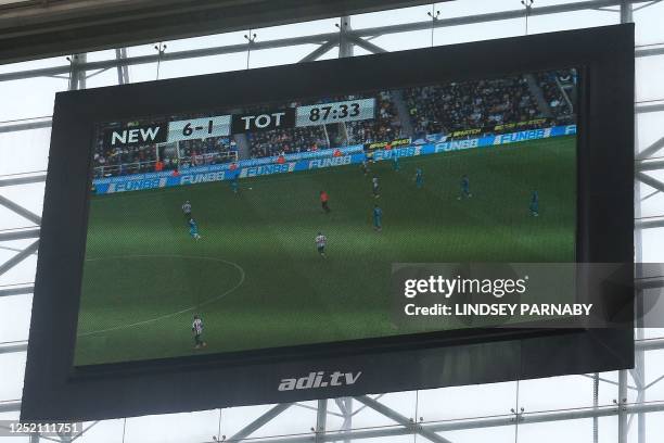 Giant screen shows the 6-1 scoreline in the closing minutes of the English Premier League football match between Newcastle United and Tottenham...