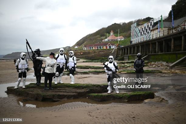 Cosplayers dressed as Star Wars characters attend Sci Fi Scarborough at The Spa Complex in Scarborough in north-east England on April 23, 2023. - The...
