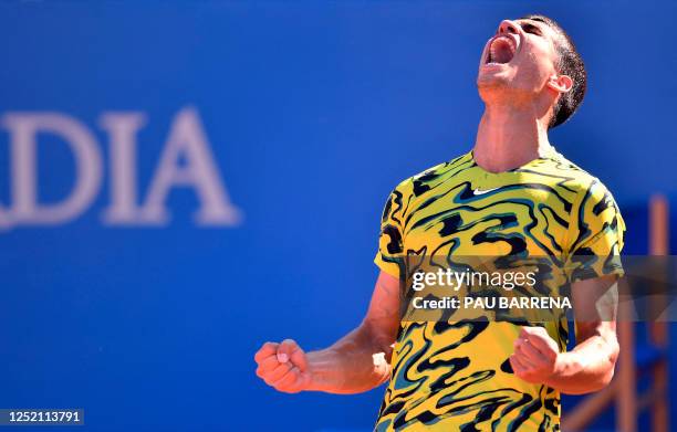 Spain's Carlos Alcaraz celebrates his victory over Greece's Stefanos Tsitsipas during the ATP Barcelona Open "Conde de Godo" tennis tournament...