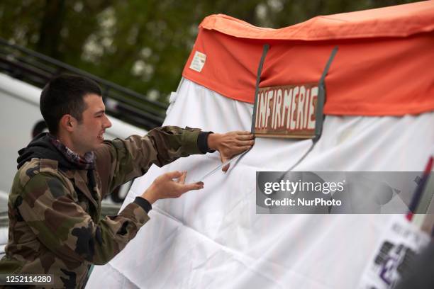 Medic install a sign 'Infirmary' in the camp agsint the A69. The collectives 'La Voie Est Libre' , the farmers organization Confederation Paysanne,...