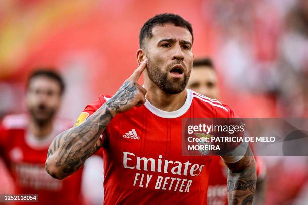 Benfica's Argentine defender Nicolas Otamendi celebrates scoring the opening goal during the Portuguese league football match between SL Benfica and...