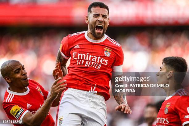 Benfica's Argentine defender Nicolas Otamendi celebrates scoring the opening goal during the Portuguese league football match between SL Benfica and...