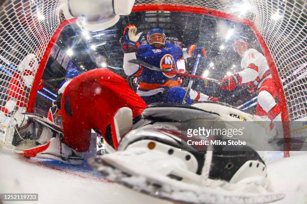 Kyle Palmieri of the New York Islanders drives to the net against Antti Raanta of the Carolina Hurricanes in Game Four of the First Round of the 2023...