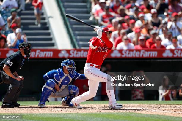 Los Angeles Angels designated hitter Shohei Ohtani hits a solo home run in the sixth inning during a regular season game between the Los Angeles...