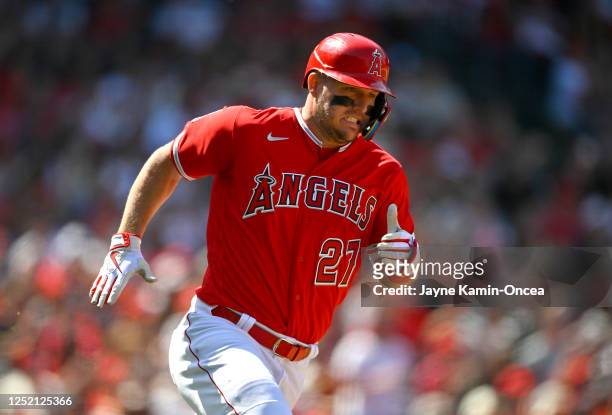 Mike Trout of the Los Angeles Angels heads to first on a double in the eighth inning against the Kansas City Royals at Angel Stadium of Anaheim on...