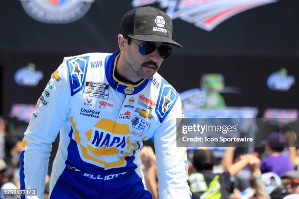 Chase Elliott shakes hands with fans during diver introductions prior to the running of the NASCAR Cup Series GEICO 500 on April 23, 2023 at...