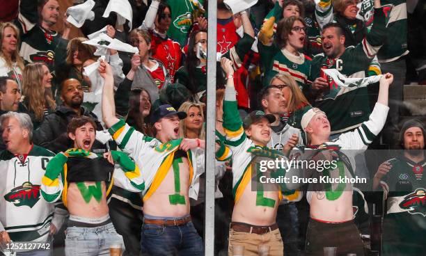 Minnesota Wild fans cheer in the stands in the third period of Game Four of the First Round of the 2023 Stanley Cup Playoffs against the Dallas Stars...