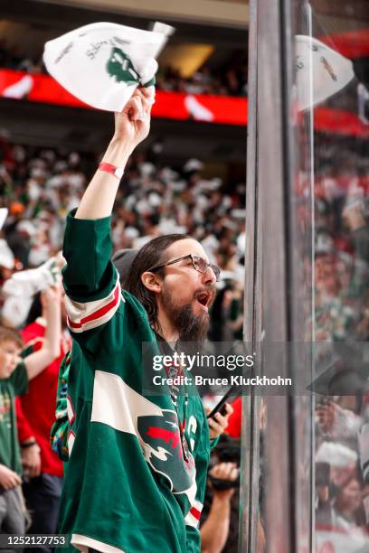 Minnesota Wild fan cheers in the stands in the third period of Game Four of the First Round of the 2023 Stanley Cup Playoffs against the Dallas Stars...