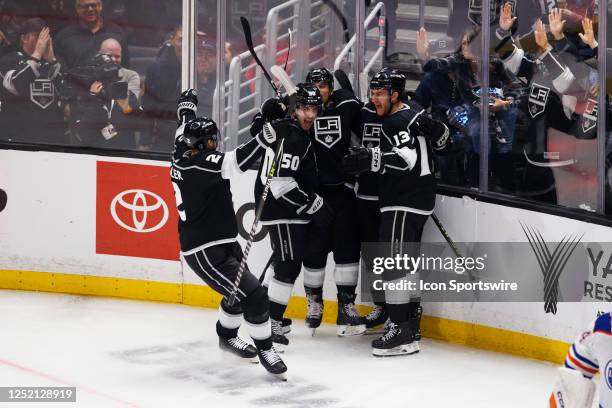 Los Angeles Kings defenseman Alexander Edler , Los Angeles Kings defenseman Sean Durzi , Los Angeles Kings right wing Gabriel Vilardi with Los...