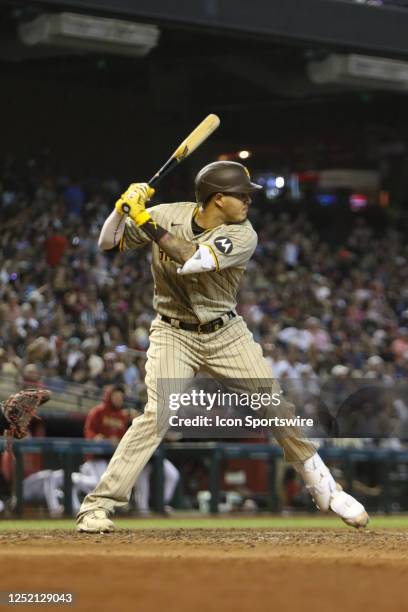 San Diego Padres third baseman Manny Machado bats during the game between the San Diego Padres and Arizona Diamondbacks on April 23 at Chase Field in...