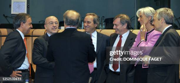 To R Cyprus Finance Minister Charilaos Stavrakis, EU economic affairs commissioner Joaquin Almunia, talks with Finance Ministers of Spain Pedro...