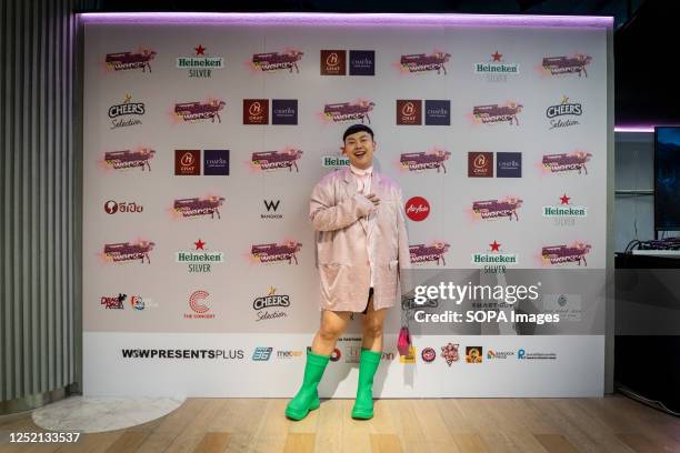 Thai influencer Toppeii poses for a photo in couture at the entrance of the event. "Drag Race Thai Fans Vs. The World," an event put on by Thai fans...