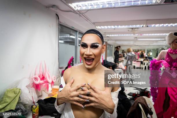 Thai drag queen Naughty Girl poses for a photo while getting ready backstage before the show. "Drag Race Thai Fans Vs. The World," an event put on by...