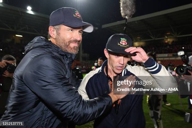 Wrexham owners Ryan Reynolds and Rob McElhenney as Wrexham celebrate promotion back to the English Football League during the Vanarama National...