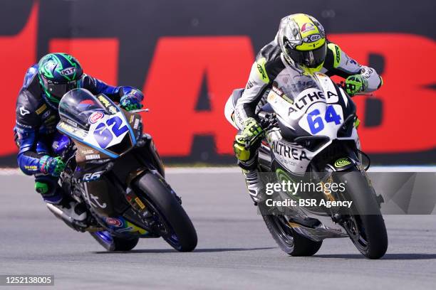 Stefano Manzi of Italy and Ten Kate Racing Yamaha, Federico Caricasulo of Italy and Althea Racing Team competing during the WorldSSP Race 2 during...