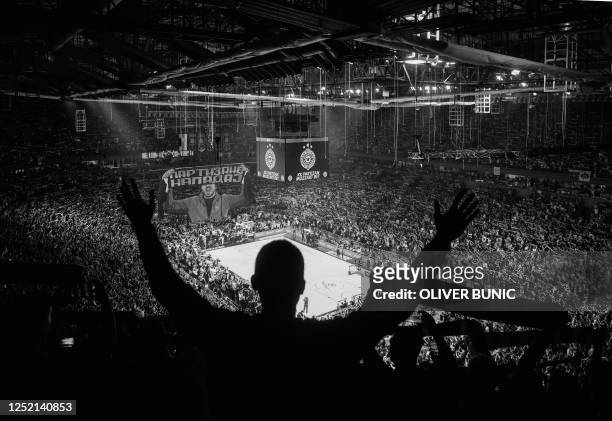 Partizan's fans cheer during the EuroLeague basketball match between KK Partizan Belgrade and Olympiacos in Belgrade, on March 24, 2023. - With sold...