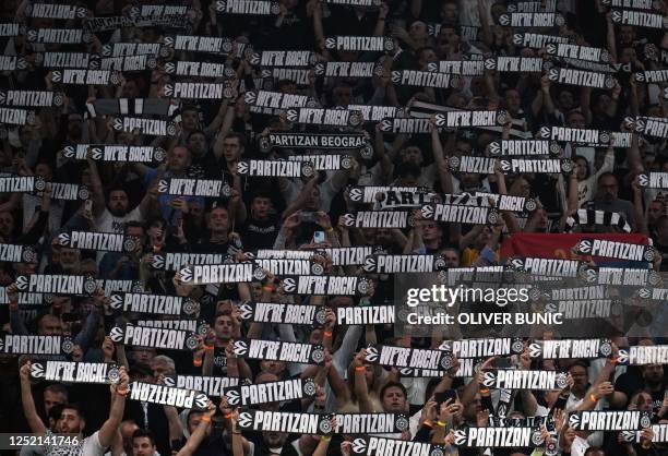 Partizan's fans cheer during the EuroLeague basketball match between BC Partizan and Olimpia Milano in Belgrade, on October 18, 2022. - With sold out...