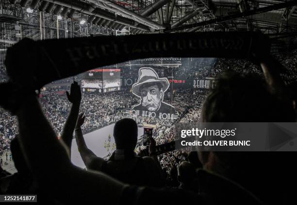 Partizan's fans cheer during the EuroLeague basketball match between KK Partizan Belgrade and Maccabi Playtime in Belgrade, on November 18, 2022. -...