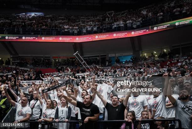 Partizan's fans cheer during the EuroLeague basketball match between KK Partizan Belgrade and AS Monaco in Belgrade, on Janury 5, 2023. - With sold...