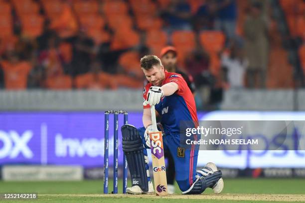 Delhi Capitals' David Warner gestures after his dismissal during the Indian Premier League Twenty20 cricket match between Sunrisers Hyderabad and...