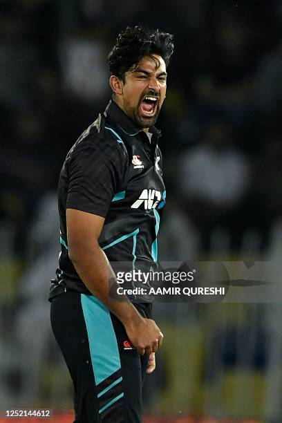 New Zealand's Ish Sodhi celebrates after taking the wicket of Pakistan's Saim Ayub during the fifth and final Twenty20 international cricket match...
