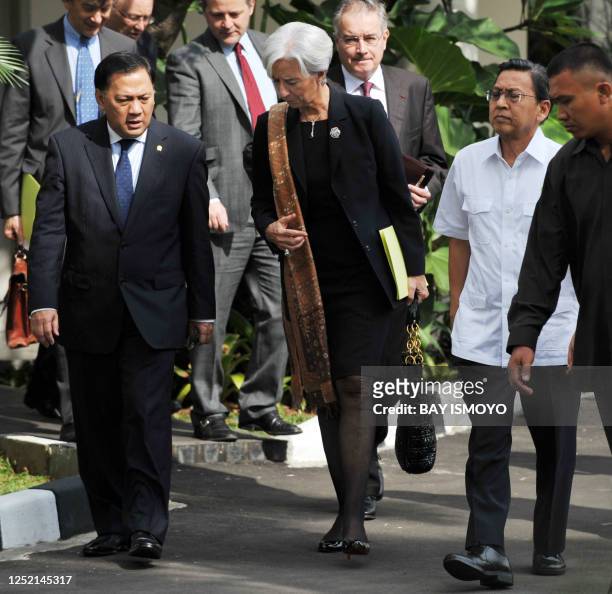 Indonesian Vice President Boediono walks together with France's Economy, Finance and Industry Minister Christine Lagarde and Indonesian Finance...