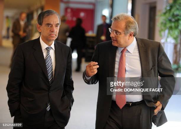 Greek Finance Minister Ioannis Papathanasiou talks with his Cypriot counterpart Charilaos Stavrakis on June 9, 2009 before the start of an Economy...