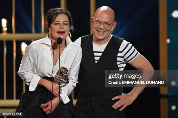 French theatre director Christian Hecq and his wife, French theatre director Valerie Lesort react after they received the Moliere of Best Stage...