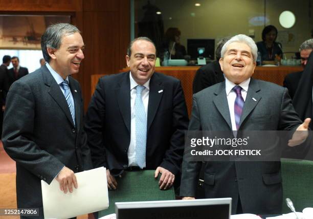 Cypriot Finance Minister Charilaos Stavrakis, Cypriot Foreign Minister Markos Kyprianou and Cypriot President Demetris Christofias attend a working...