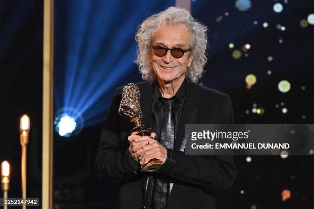 Canadian producer and song writer Luc Plamondon reacts as he receives the Moliere of the Best Musical for "Starmania", during the 34th Moliere awards...