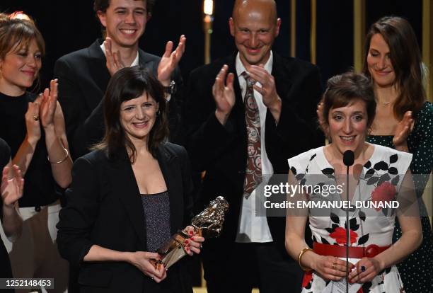 French actress and stage director Johanna Boye , flanked by French actress Elisabeth Ventura speaks after they received the Moliere from young...